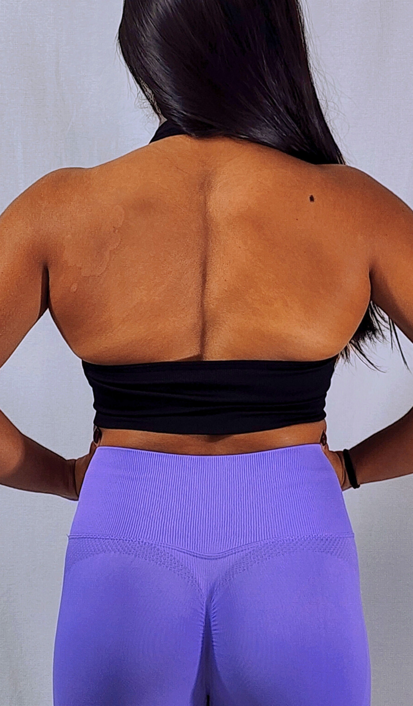 Gym Brand Apparel black halter sports bra back view.