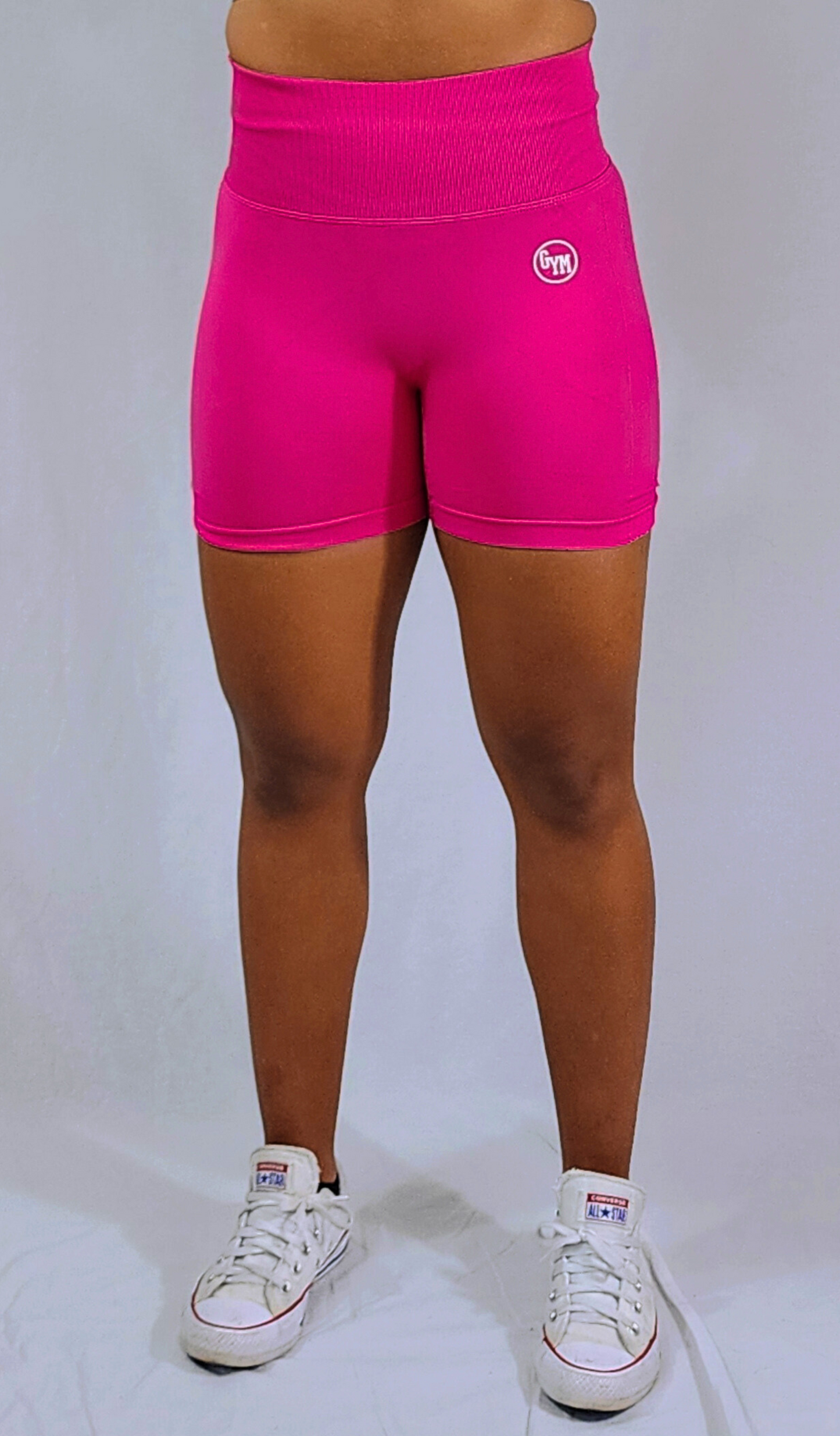 Gym Brand Apparel pink shorts front view.