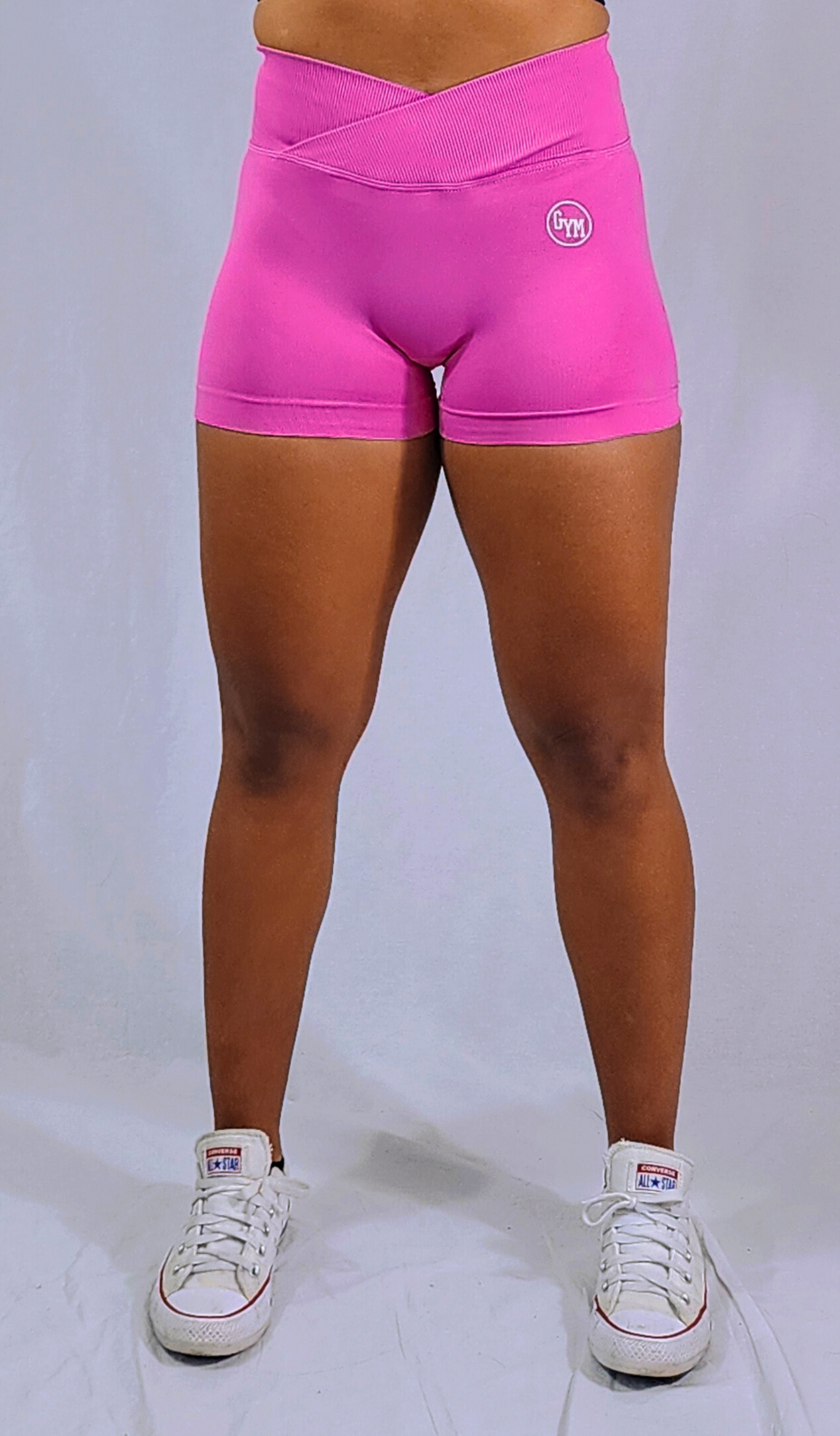 Gym Brand Apparel pink shorts front view.