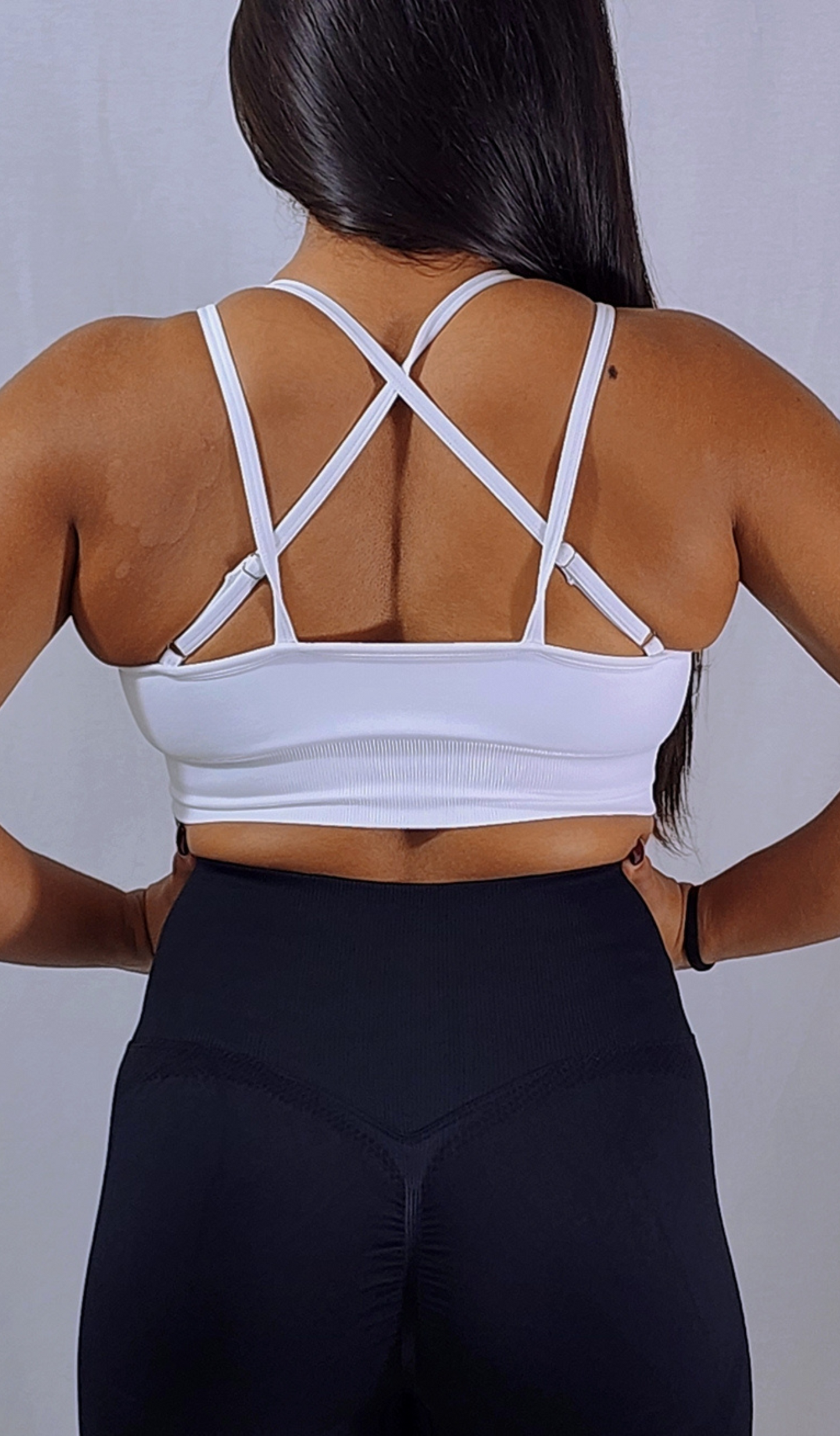 Gym Brand Apparel white strap back sports bra back view.